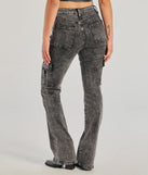 The Bold High-Rise Acid Wash Cargo Jeans is a trendy women's bottom in black, designed with modern details and alluring textures to complete chic outfits for 2025.