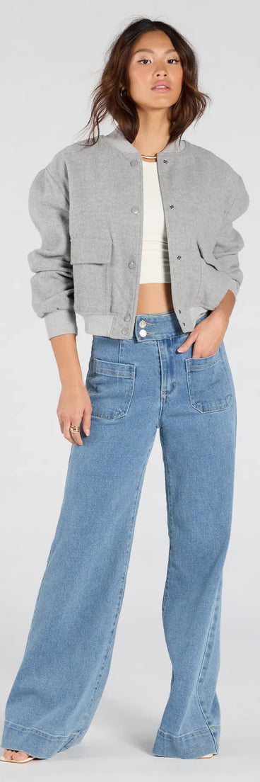 Create bold, fashion-forward looks for spring or summer with the Extra Trendy High Rise Wide Leg Trouser Denim Jeans in medium denim wash, a must-have piece from Windsor’s collection of stylish bottoms for women.