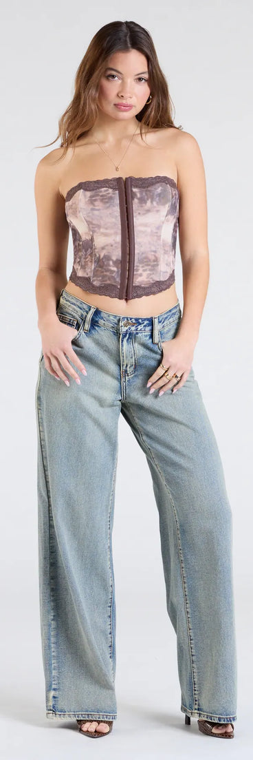 Create bold, fashion-forward looks for summer with the Fresh Take Mid-Rise Baggy Denim Jeans in denim blue, a must-have piece from Windsor’s collection of stylish bottoms for women.