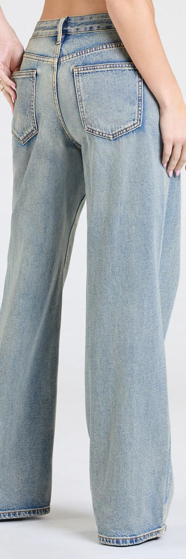 Elevate everyday looks with the Fresh Take Mid-Rise Baggy Denim Jeans, a sleek pair of denim blue jeans designed for comfort, shape, and style.