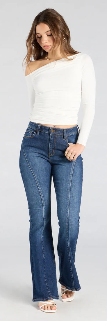 Elevate everyday looks with the Make A Scene Mid-Rise Flare Denim Jeans, a sleek pair of dark denim wash jeans designed for comfort, shape, and style.