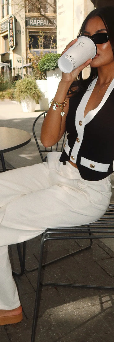 Create bold, fashion-forward looks for summer with the Perfect Day High-Rise Straight Leg Denim Jeans in ivory, a must-have piece from Windsor’s collection of stylish bottoms for women.