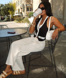 Create bold, fashion-forward looks for spring or summer with the Perfect Day High-Rise Straight Leg Denim Jeans in ivory, a must-have piece from Windsor’s collection of stylish bottoms for women.