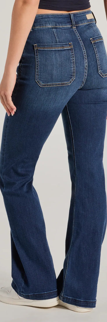 The Effortless Staple High-Rise Bootcut Jeans is a trendy women's bottom in dark denim wash, designed with modern details and alluring textures to complete chic outfits for 2025.