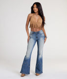 Pair the Got A Flare For It High Rise Denim Jeans with your favorite crop or bodysuit for effortless warm-weather looks with on-trend dark denim wash jeans that speak your style.