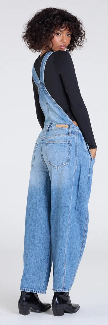 Elevate summer looks with the Casual Aesthetic Baggy Denim Overalls, a sleek pair of medium denim wash jeans designed for comfort, shape, and style.