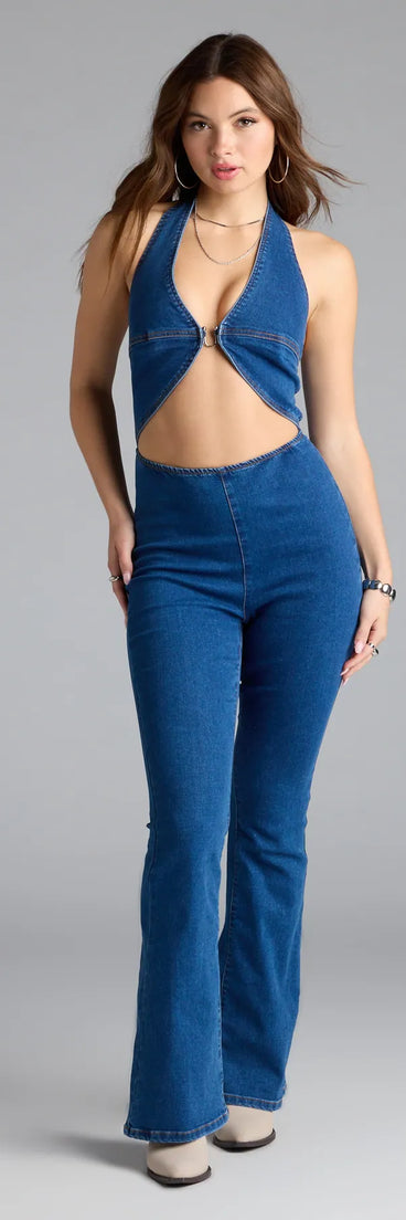 The Season Premier Halter Cutout Denim Jumpsuit in medium denim wash brings edge and energy to your vibe, ready to elevate any festival look or concert outfit.