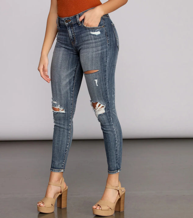 Josie Mid Rise Destructed Skinny Jeans