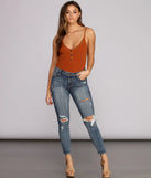 Josie Mid Rise Destructed Skinny Jeans