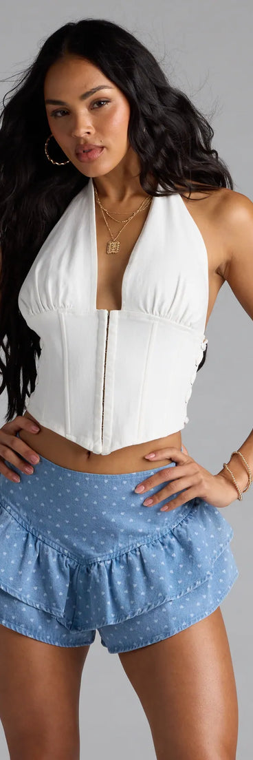 Complete your transitional-weather wardrobe with the Wild Heart Print High-Rise Denim Skort, a trendy skort in light blue made to mix, match, and stand out.