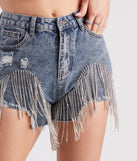 The On The Fringe Rhinestone Denim Shorts is a trendy women's bottom in medium denim wash, designed with modern details and alluring textures to complete chic outfits for 2025.