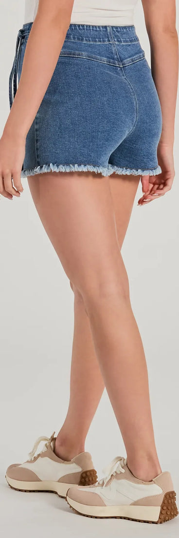 Get the best of both worlds with the Stylish Appearance Side-Tie Wrap Denim Skort, a dark denim wash denim skort that blends bold style with playful comfort.