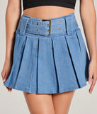 Get the look of a skirt and the comfort of shorts in the Casual Darling High-Rise Belted Pleated Denim Skort in medium denim wash, perfect for staying stylish while on the move this summer.