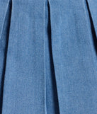 Create bold, fashion-forward looks for spring or summer with the Casual Darling High-Rise Belted Pleated Denim Skort in medium denim wash, a must-have piece from Windsor’s collection of stylish bottoms for women.