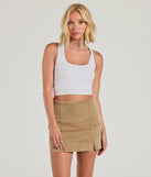 The Trendy Girl High-Rise Slit Denim Skort is a trendy women's bottom in tan, designed with modern details and alluring textures to complete chic outfits for 2025.