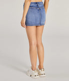 The Total Perfection Mid Rise Denim Mini Skort is a trendy women's bottom in dark denim wash, designed with modern details and alluring textures to complete chic outfits for 2025.