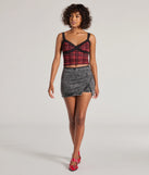 Create bold, fashion-forward looks for spring or summer with the Edgy Style Acid-Wash Denim Skort in black, a must-have piece from Windsor’s collection of stylish bottoms for women.