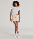 Create bold, fashion-forward looks for spring or summer with the Casual Slay Mid Rise Belted Denim Skort in beige, a must-have piece from Windsor’s collection of stylish bottoms for women.