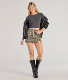 Create bold, fashion-forward looks for spring or summer with the Elevated Edgy Snake Print Denim Mini Skort in snake print, a must-have piece from Windsor’s collection of stylish bottoms for women.