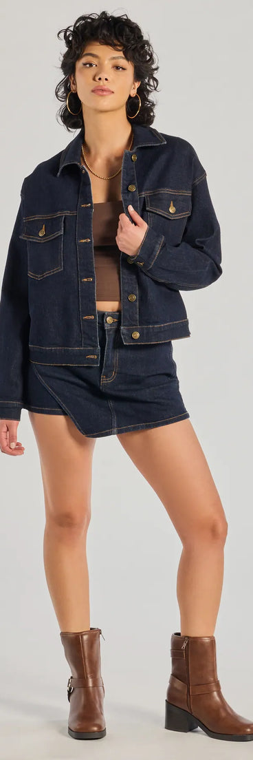 The Trendy Casual High-Rise Denim Skort is a trendy women's bottom in dark denim wash, designed with modern details and alluring textures to complete chic outfits for 2025.