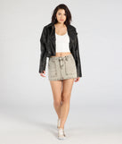 Get the look of a skirt and the comfort of shorts in the Hit The City Mid-Rise Acid Denim Skort in sage green, perfect for staying stylish while on the move this summer.