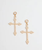 The Blessed Style Faux Pearl Cross Earrings in gold brings edge and energy to your vibe, ready to elevate any festival look or concert outfit.