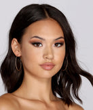 The Tiny & Textured Shimmer Hoops in gold is an elevated pick for your best outfit yet, effortlessly delivering a polished look that's sure to turn heads at any celebration.