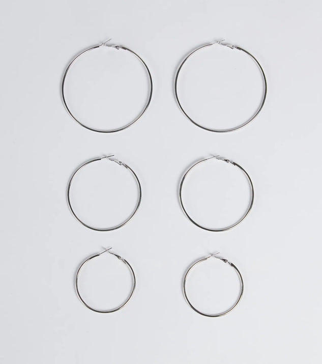 The Essential Three-Pack Hoop Earrings Set in silver is a women's workwear essential with an elevated fabric and chic silhouette, ideal for layering and versatile enough to take your look from office chic to going-out ready!