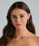 The Pretty Sparkle Rhinestone Hoop Earrings in gold is a women's workwear piece offering a trendy style and unique accents, perfect for effortlessly creating an outfit-of-the-day look that transitions your office look to going-out ready.