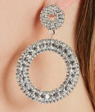 The Dazzling Shine Rhinestone Hoop Earrings in silver is an elevated pick for your best outfit yet, effortlessly delivering a polished look that's sure to turn heads at any celebration.