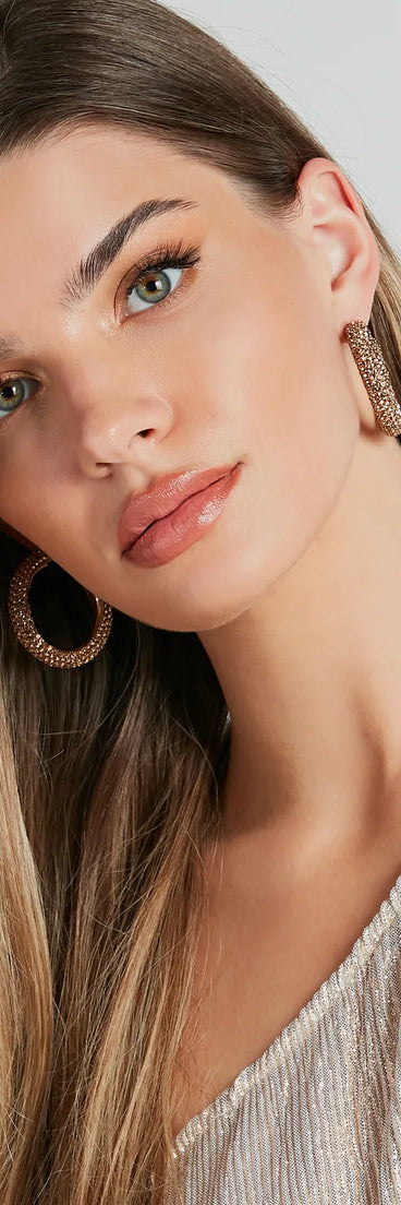 Get ready for any event with the Glitzy Soiree Rhinestone-Beaded Hoop Earrings in gold, an essential start to creating a versatile holiday outfit for women for holiday parties, cocktail hours, or NYE events.