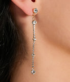 The Beauty Perfection Linear Rhinestone Earrings in gold brings sleek style to any graduation outfit, from cap and gown to after-party.