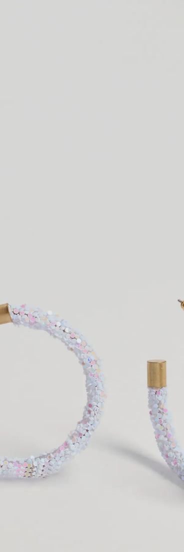 Get inspired with the Glowing Nights Iridescent Hoop Earrings, a feed-worthy piece that’s part of Windsor's updated and curated women’s clothing edit packed with must-have fall outfit ideas.