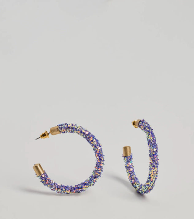 
Upgrade your style game for 2025 with the Glowing Nights Iridescent Hoop Earrings in purple, perfect for any fashion-forward wardrobe.