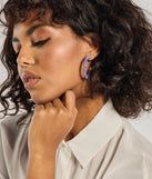 
Upgrade your style game for 2025 with the Glowing Nights Iridescent Hoop Earrings in purple, perfect for any fashion-forward wardrobe.