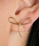 The Pretty Style Dainty Bow Stud Earrings brings sleek style to any graduation outfit, from cap and gown to after-party.