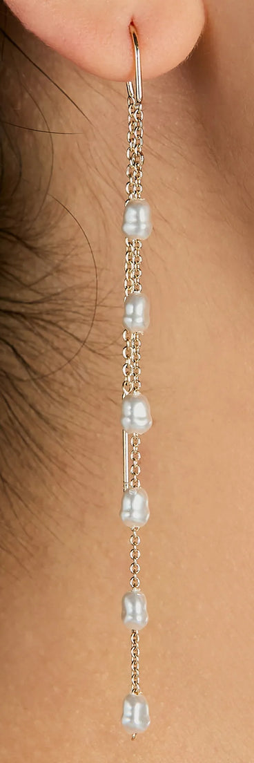 The Dainty Chic Pearl Chain Threader Earrings brings sleek style to any graduation outfit, from cap and gown to after-party.