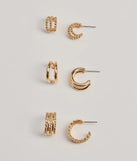 The Glam Attitude Three-Pack Hoop Earrings Set in gold is a women's workwear essential with an elevated fabric and chic silhouette, ideal for layering and versatile enough to take your look from office chic to going-out ready!