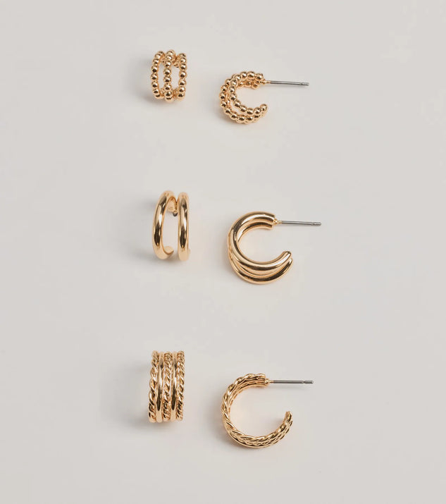 The Glam Attitude Three-Pack Hoop Earrings Set in gold is a women's workwear essential with an elevated fabric and chic silhouette, ideal for layering and versatile enough to take your look from office chic to going-out ready!