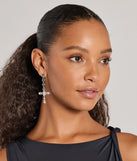 The Glam Sheen Rhinestone Cross Earrings brings edge and energy to your vibe, ready to elevate any festival look or concert outfit.