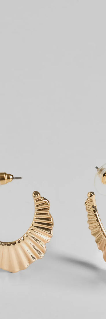 The Stand Out Texture Oval Hoop Earrings in gold is a women's workwear essential with an elevated fabric and chic silhouette, ideal for layering and versatile enough to take your look from office chic to going-out ready!