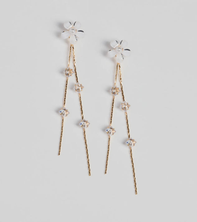 The Graceful Flair Floral Linear Earrings in white brings sleek style to any graduation outfit, from cap and gown to after-party.