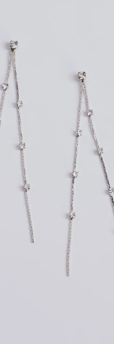 The Dainty Glamour Rhinestone Linear Earrings in silver brings sleek style to any graduation outfit, from cap and gown to after-party.