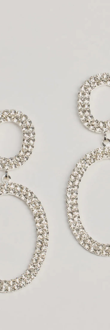 The Trendy Sparkle Rhinestone Drop Earrings in silver brings sleek style to any graduation outfit, from cap and gown to after-party.