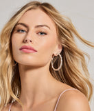 Glam Glow Rhinestone Twist Hoop Earrings, a trendy silver addition to women's going-out outfits, is ideal for Christmas party outfits, chic NYE attire, or winter night-out looks that keep you on-trend!