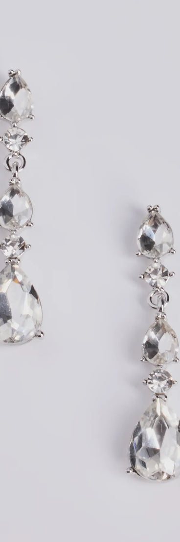 The Gorgeous Glitz Teardrop Rhinestone Drop Earrings helps create a chic silver women's cocktail outfit with a trendy texture and stylish design, ideal for wedding guest cocktail outfits or dinner parties.
