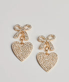 Get ready for any event with the Whimsy Charm Rhinestone Bow And Heart Earrings in gold, an essential start to creating a versatile holiday outfit for women for holiday parties, cocktail hours, or NYE events.