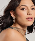 Get ready for any event with the Whimsy Charm Rhinestone Bow And Heart Earrings in gold, an essential start to creating a versatile holiday outfit for women for holiday parties, cocktail hours, or NYE events.