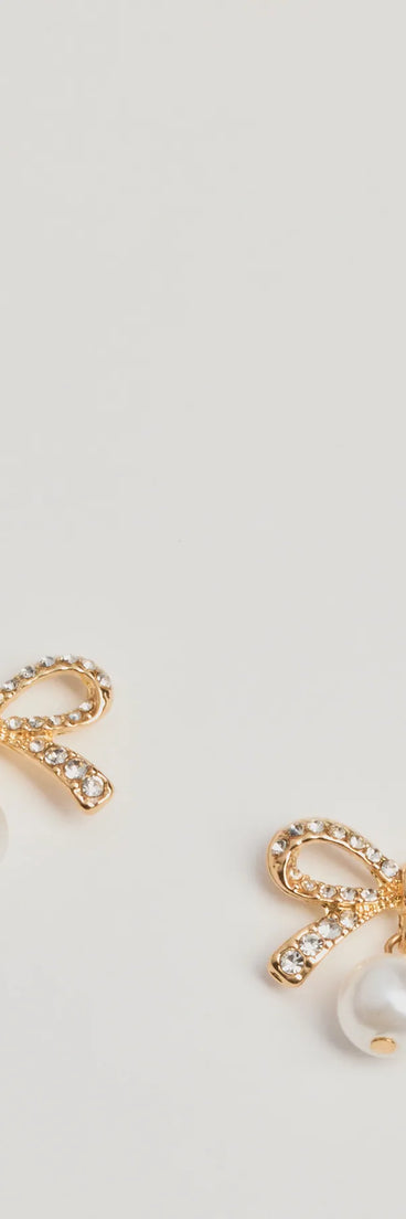 Get inspired with the Sweet Moments Rhinestone Bow And Faux Pearl Earrings, a feed-worthy gold piece that’s part of Windsor's updated and curated women’s clothing edit packed with must-have fall outfit ideas.