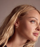 The Sleek Design Hoop Earrings Set in gold is a women's workwear piece offering a trendy style and unique accents, perfect for effortlessly creating an outfit-of-the-day look that transitions your office look to going-out ready.